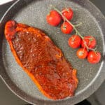 AVO Lafiness Whiskey and Black Pepper Butchers' Marinade on Raw Steak
